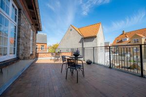 En balkon eller terrasse på Det Gamle Posthus