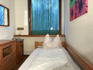 Postel nebo postele na pokoji v ubytování Haus Merian
