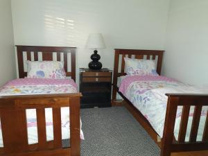 Postel nebo postele na pokoji v ubytování Miner's Retreat