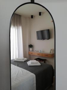 Posteľ alebo postele v izbe v ubytovaní LENICO Seafront Villa