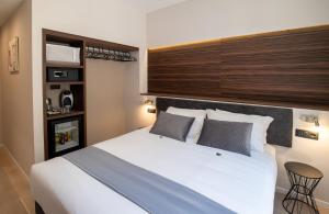 Postel nebo postele na pokoji v ubytování Aiello Hotels - Centrale