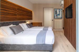 Krevet ili kreveti u jedinici u okviru objekta Aiello Hotels - Centrale