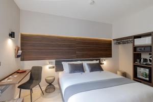 Postel nebo postele na pokoji v ubytování Aiello Hotels - Centrale