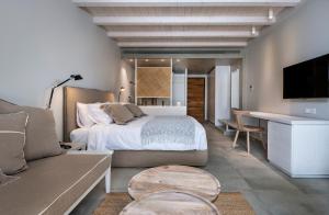 Postel nebo postele na pokoji v ubytování Caravia Beach Hotel
