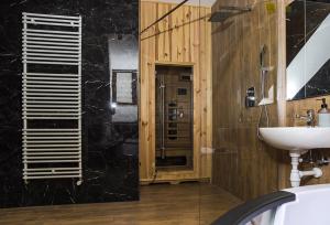 Ένα μπάνιο στο Apartamenty Premium De Lux +22 φωτογραφίες