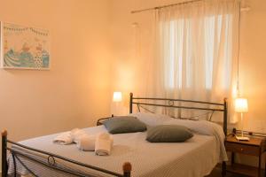 Postel nebo postele na pokoji v ubytování Kristallia - Elounda seafront vacation rental