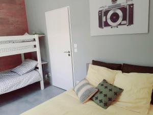 Lova arba lovos apgyvendinimo įstaigoje Esprit Bistrot / Rent4night Grenoble