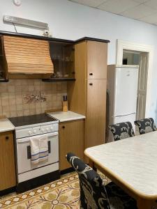 A kitchen or kitchenette at Angolina Apartments 130