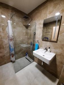Ein Badezimmer in der Unterkunft Lux Apartment Talija