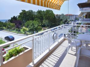 En balkon eller terrasse på Ikaros Apartments