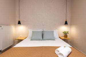 A bed or beds in a room at Vardakis house - 5 minutes from the famous Shipwreck Beach by Villa Mana Gers