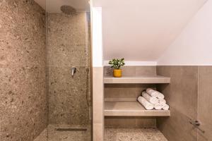 A bathroom at Vardakis house - 5 minutes from the famous Shipwreck Beach by Villa Mana Gers