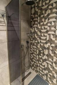 Koupelna v ubytování AURA APARTMENTS