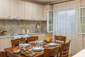 A kitchen or kitchenette at Vardakis house - 5 minutes from the famous Shipwreck Beach by Villa Mana Gers