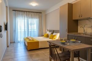 Kuchyň nebo kuchyňský kout v ubytování AURA APARTMENTS