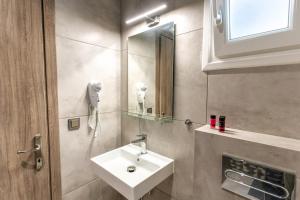 Koupelna v ubytování AURA APARTMENTS