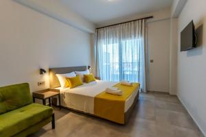 Postel nebo postele na pokoji v ubytování AURA APARTMENTS