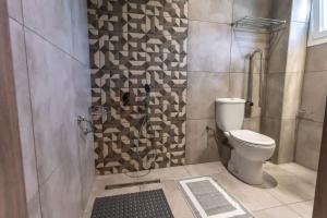 Koupelna v ubytování AURA APARTMENTS