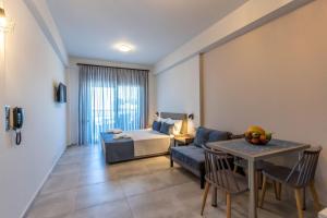 Postel nebo postele na pokoji v ubytování AURA APARTMENTS