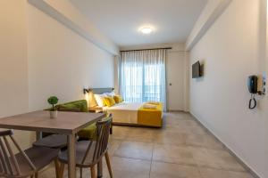 Postel nebo postele na pokoji v ubytování AURA APARTMENTS