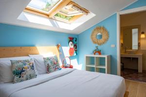 Giường trong phòng chung tại Villa Borgo Duino