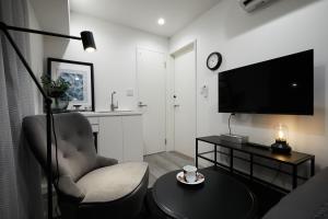 TV a/nebo společenská místnost v ubytování Designers Hotel Siesta
