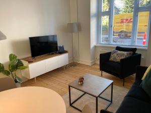 Posezení v ubytování Bright apartment in elegant Østerbro