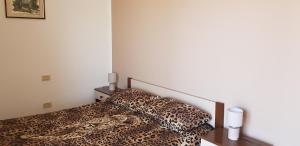 A bed or beds in a room at Vacanze in Sicilia