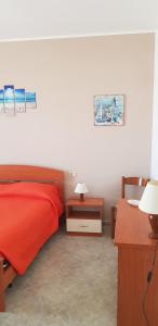 A bed or beds in a room at Vacanze in Sicilia