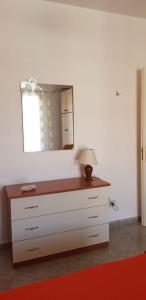 A bed or beds in a room at Vacanze in Sicilia