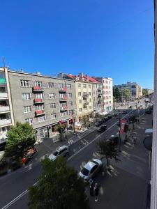 a view of a city street with cars and buildings at 02 Gdynia Centrum - Apartament Mieszkanie dla 2 os in Gdynia