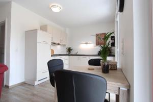 Η κουζίνα ή μικρή κουζίνα στο Am Ring 36 Whg 3 Otto