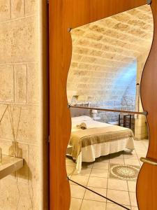 Postel nebo postele na pokoji v ubytování Suite Arco 166 Stanza privata