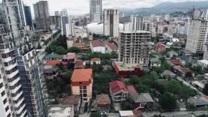 an aerial view of a city with tall buildings at Batumi Hotel in Batumi