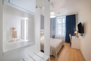 Posteľ alebo postele v izbe v ubytovaní Hotel Traffic Wrocław Stare Miasto