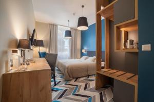 Posteľ alebo postele v izbe v ubytovaní Hotel Traffic Wrocław Stare Miasto