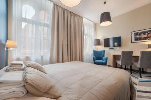 Posteľ alebo postele v izbe v ubytovaní Hotel Traffic Wrocław Stare Miasto