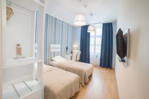 Posteľ alebo postele v izbe v ubytovaní Hotel Traffic Wrocław Stare Miasto