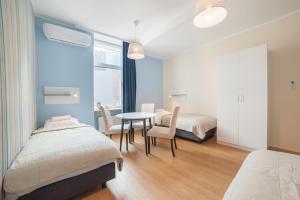 Posteľ alebo postele v izbe v ubytovaní Hotel Traffic Wrocław Stare Miasto