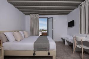 Posteľ alebo postele v izbe v ubytovaní Argo Boutique Hotel