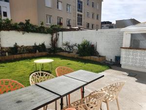 Κήπος έξω από το Suites Clémenceau