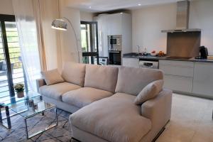 Zona de estar de ALEGRIA DE VIVIR EXCLUSIV 2 bedroom appartment pool, parking, wifi, netflix, padel and more
