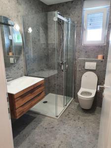 Koupelna v ubytování Villa Mondee