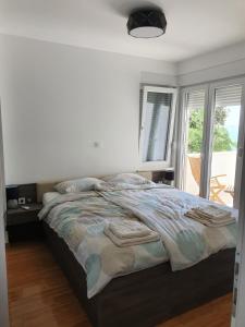 Postel nebo postele na pokoji v ubytování Villa Mondee
