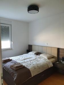 Postel nebo postele na pokoji v ubytování Villa Mondee