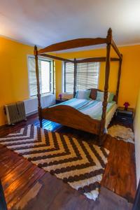 Ένα ή περισσότερα κρεβάτια σε δωμάτιο στο Guest House Planinska Sreshta