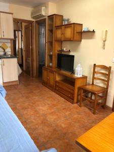 A kitchen or kitchenette at Apartamentos Cantarero Maro Nerja