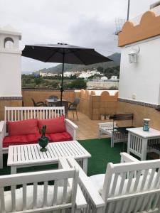 A balcony or terrace at Apartamentos Cantarero Maro Nerja