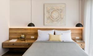 Ένα ή περισσότερα κρεβάτια σε δωμάτιο στο Soleado Luxury Villas