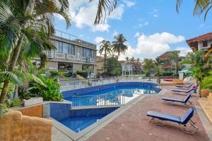 Bazén v ubytování Club Mahindra Acacia Palms nebo v jeho okolí